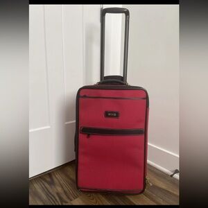 T. Anthony never used ROLLING luggage RED